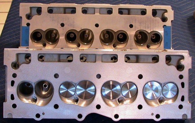 http://i1127.photobucket.com/albums/l621/danielcjones2/Buick%20Olds%20Rover%20Aluminum%20V8/TA_Rover_heads_chambers_with_and_without_valves_50percent_zpsewqee72e.jpg