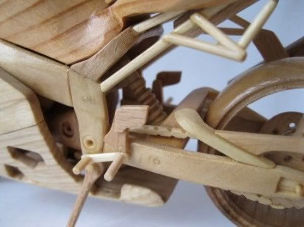 http://i1127.photobucket.com/albums/l624/jexgill/Bikes%20Made%20Out%20Of%20Wood/411.jpg