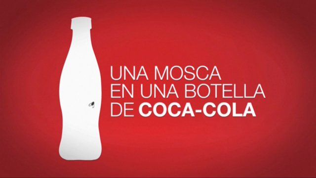 una mosca 1 - Una mosca en una botella de Coca-Cola