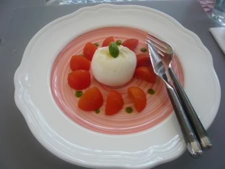 Raffles Courtyard's Burrata with fresh tomatoes