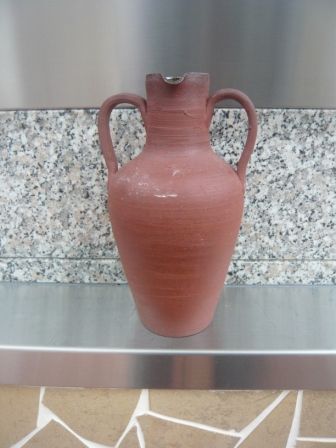 Wines served in miniature Terra Cotta Anforas