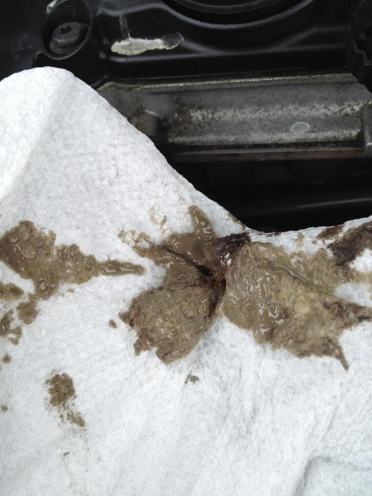 Why does my oil cap and inlet tube look like this? whats going on VW