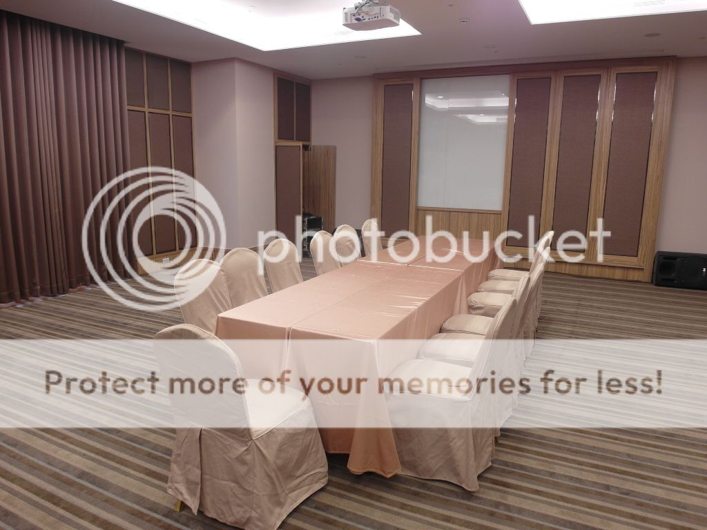  Formal Meeting Room with retractable frames to expose a white board behind - a really cool idea!